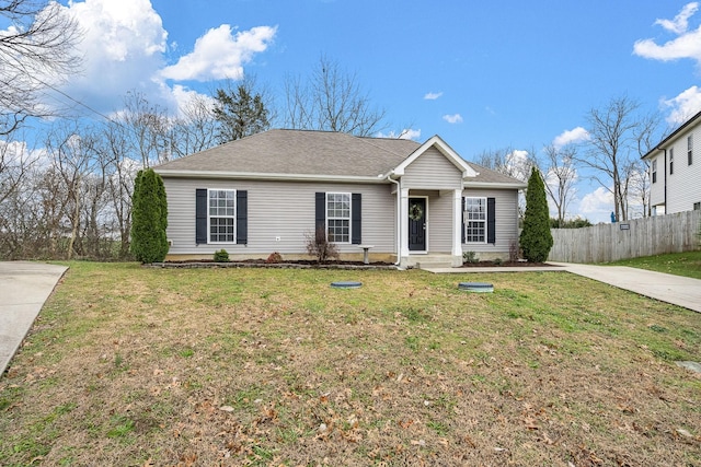 single story home with a front lawn