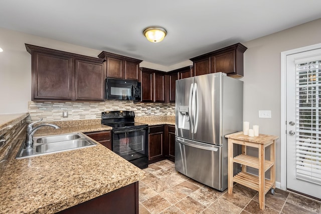 kitchen with sink, dark brown cabinetry, and black appliances