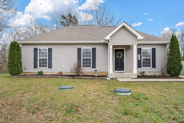 single story home with a front lawn