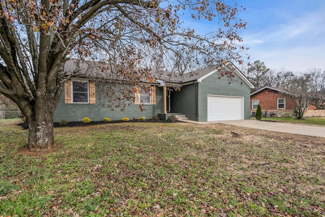 ranch-style home with a garage and a front lawn