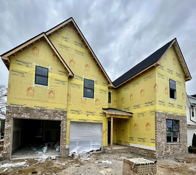 property in mid-construction featuring a garage