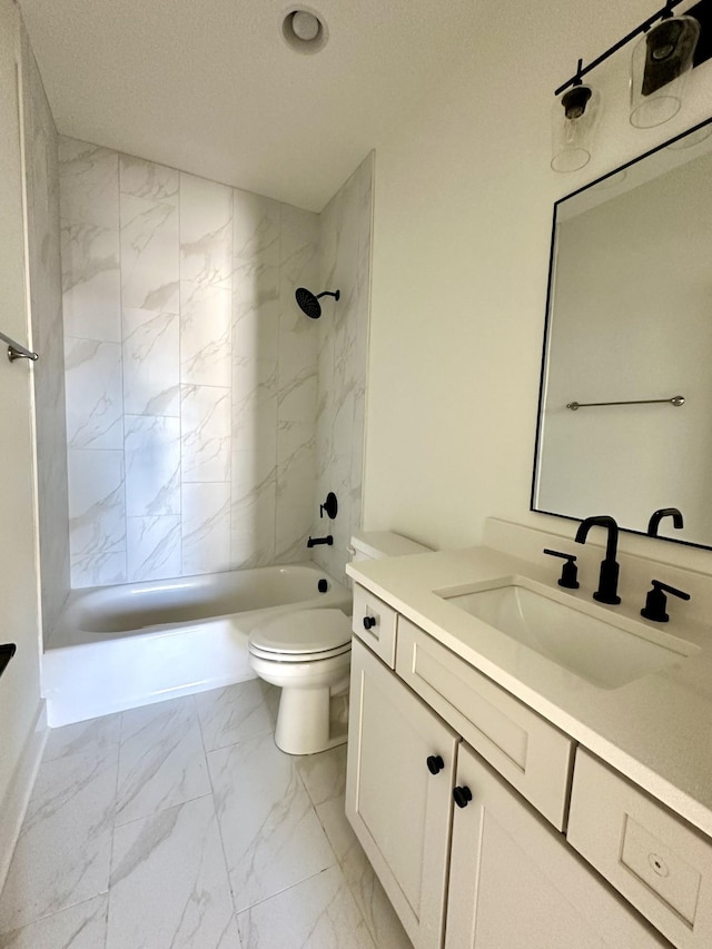 full bathroom with marble finish floor, shower / bath combination, toilet, a textured ceiling, and vanity