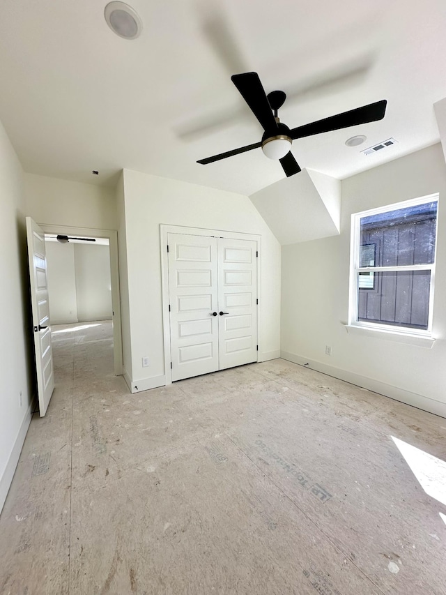 unfurnished bedroom featuring a ceiling fan, a closet, visible vents, and baseboards