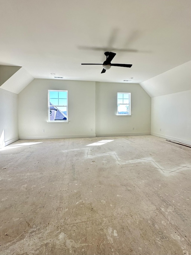 bonus room featuring vaulted ceiling, visible vents, and a ceiling fan