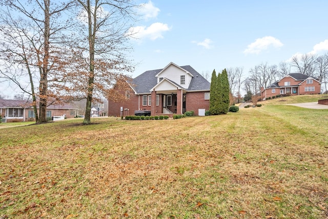 view of front of property with a front lawn