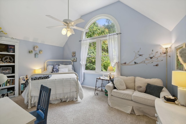 bedroom featuring carpet, vaulted ceiling, and ceiling fan