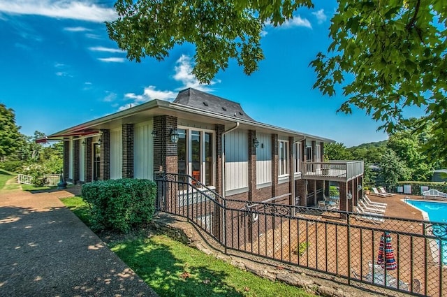 exterior space featuring a community pool