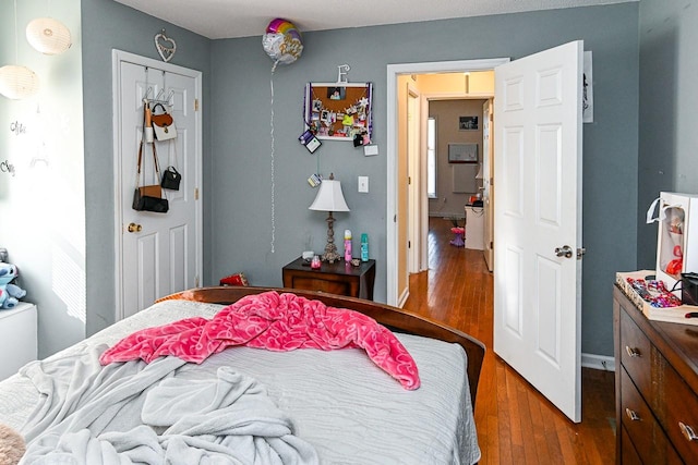 bedroom featuring hardwood / wood-style floors