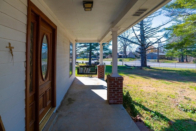 view of patio / terrace with a porch