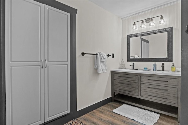 bathroom featuring vanity and hardwood / wood-style flooring