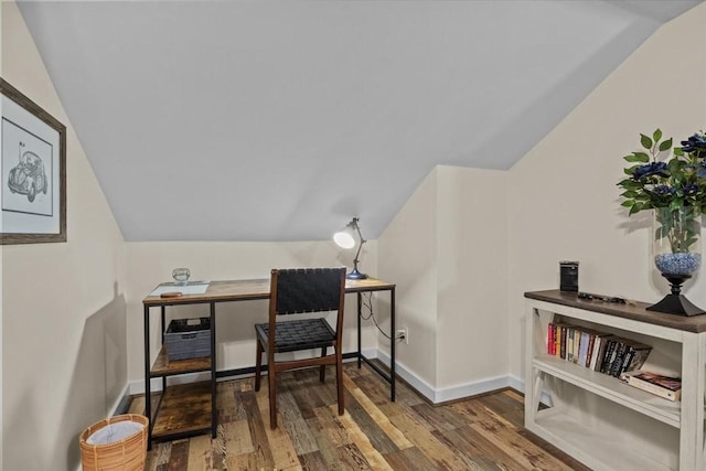 home office featuring dark hardwood / wood-style floors and lofted ceiling