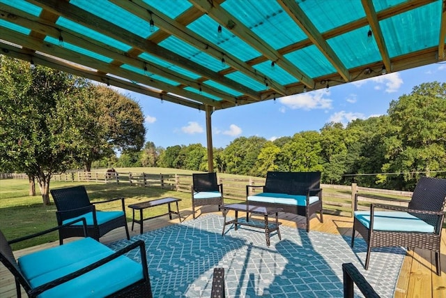 view of patio featuring outdoor lounge area, a rural view, and a gazebo