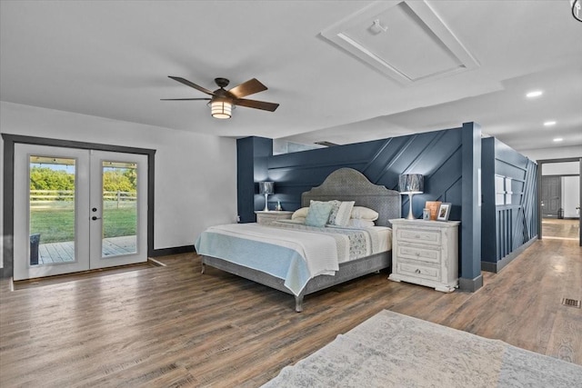 bedroom featuring ceiling fan, dark hardwood / wood-style flooring, access to outside, and french doors