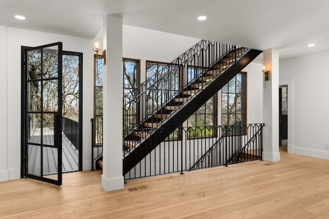 entrance foyer with light hardwood / wood-style floors