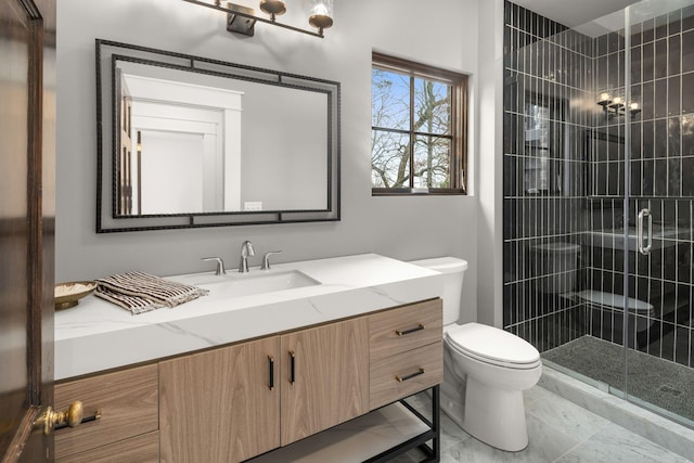 bathroom with walk in shower, vanity, and toilet