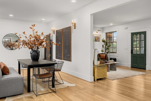 dining room with light hardwood / wood-style floors