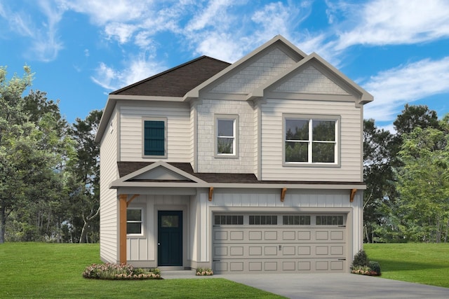 view of front of property featuring a garage and a front lawn