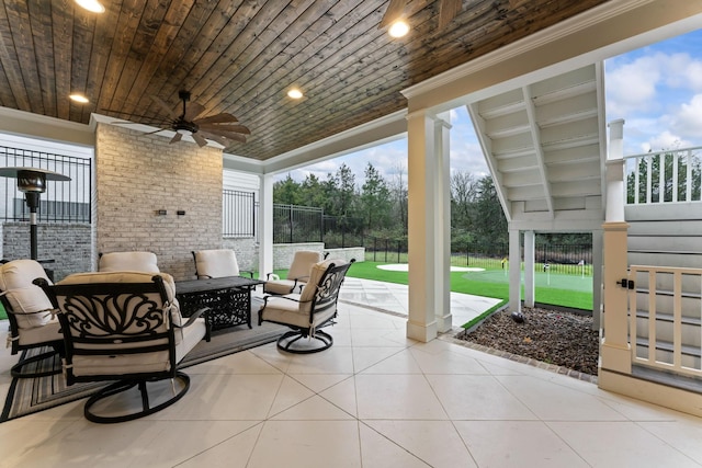 view of patio with ceiling fan