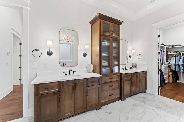 bathroom with vanity and crown molding