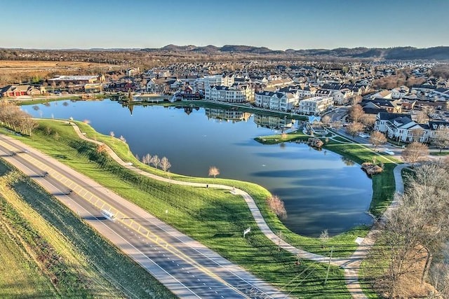 bird's eye view featuring a water and mountain view