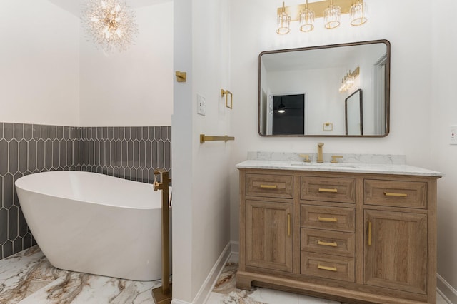 bathroom featuring vanity and a bathing tub