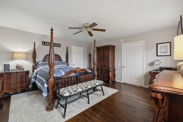 bedroom with ceiling fan and dark hardwood / wood-style floors