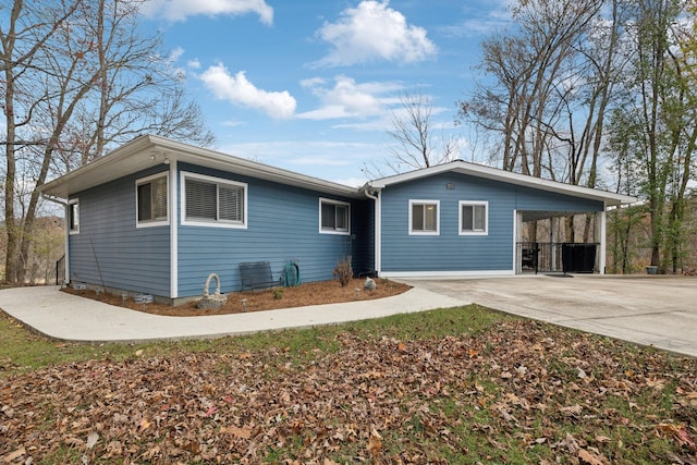 view of front of house featuring a carport