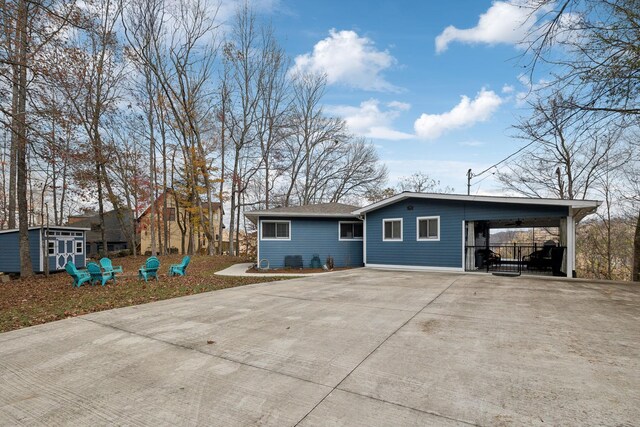 exterior space with a carport