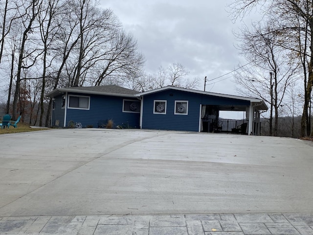 view of front of house featuring a carport