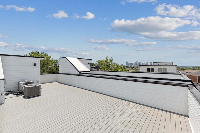 wooden terrace with central AC unit