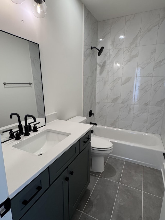 bathroom featuring tub / shower combination, toilet, and vanity