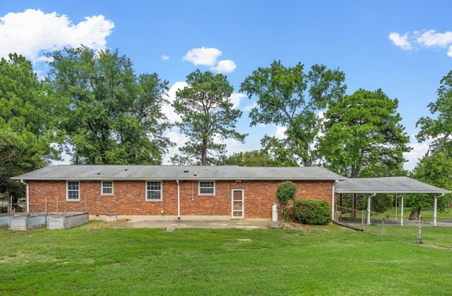 rear view of house with a lawn