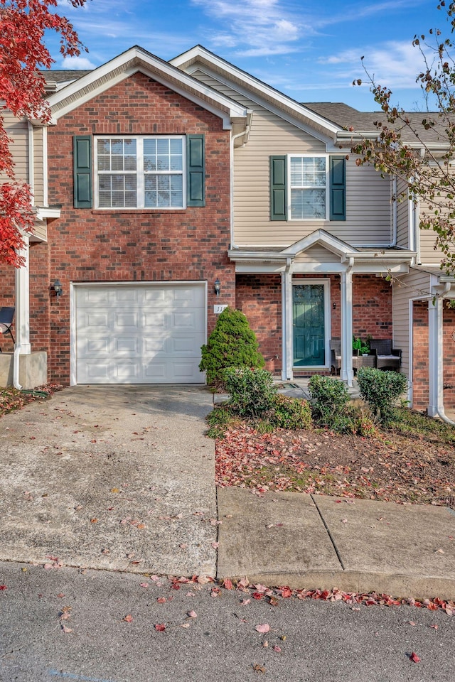 view of front of property with a garage