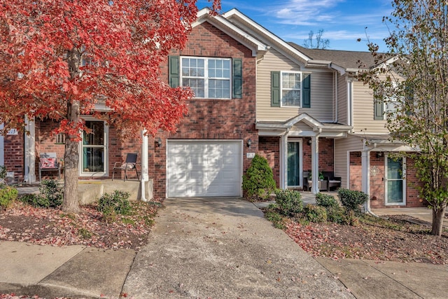 view of front of property with a garage