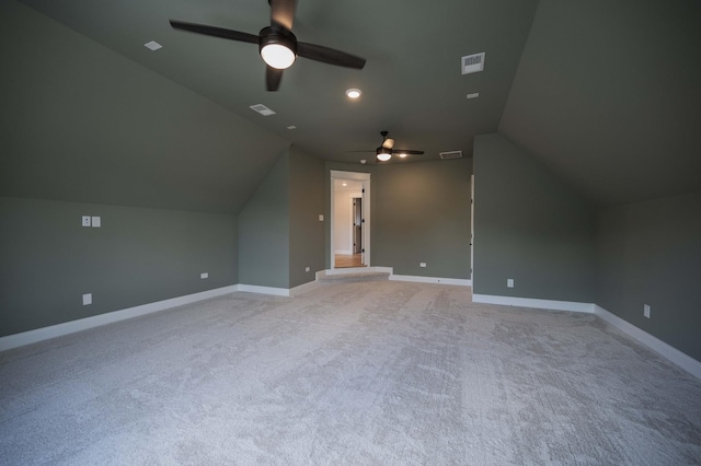 bonus room featuring light carpet, ceiling fan, and lofted ceiling