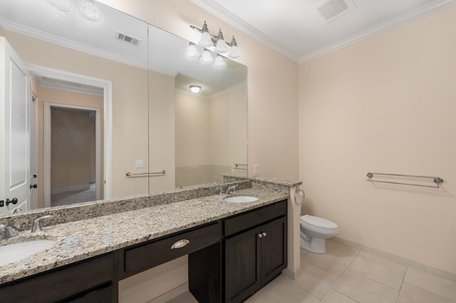 bathroom with tile patterned floors, vanity, toilet, and ornamental molding