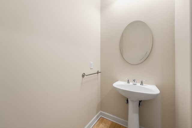 bathroom featuring wood-type flooring