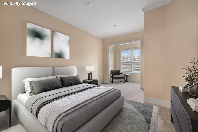 bedroom with light carpet and crown molding