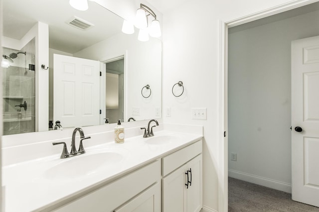 bathroom with vanity and walk in shower