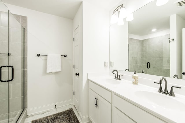 bathroom featuring vanity and walk in shower