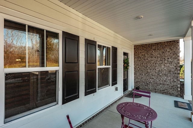 view of patio featuring a porch