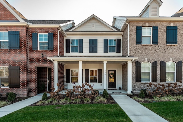 multi unit property featuring covered porch