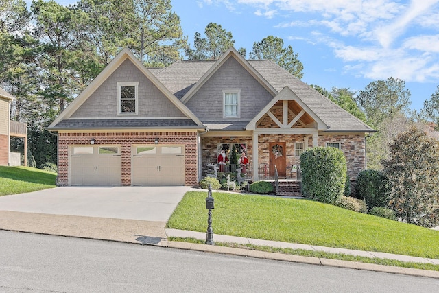 craftsman-style house featuring a front yard, a garage, and covered porch