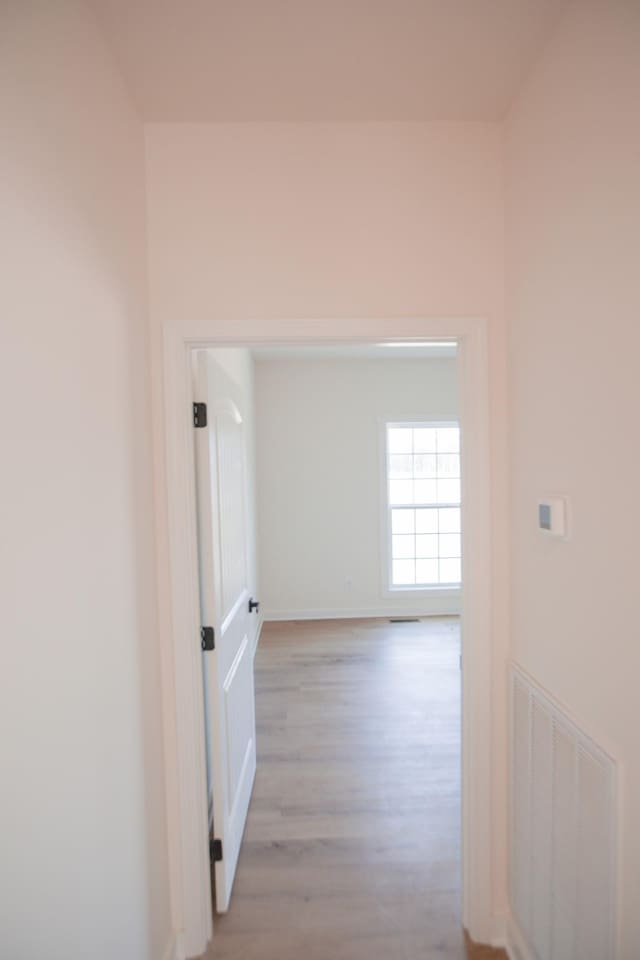 hallway featuring light wood-type flooring