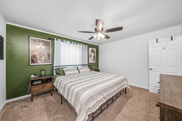 carpeted bedroom with a textured ceiling, ceiling fan, and crown molding