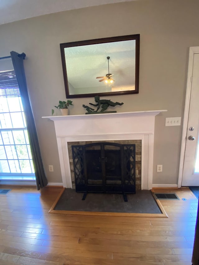 details with ceiling fan and hardwood / wood-style floors