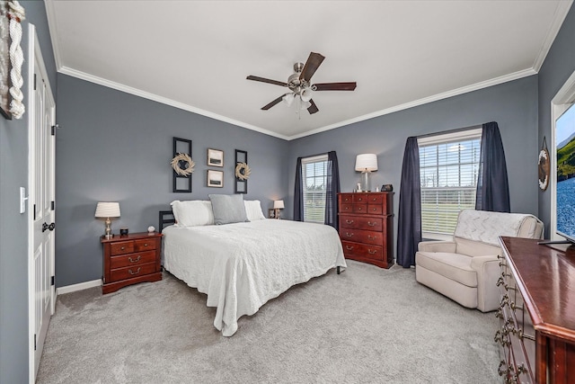 carpeted bedroom with multiple windows, crown molding, and ceiling fan