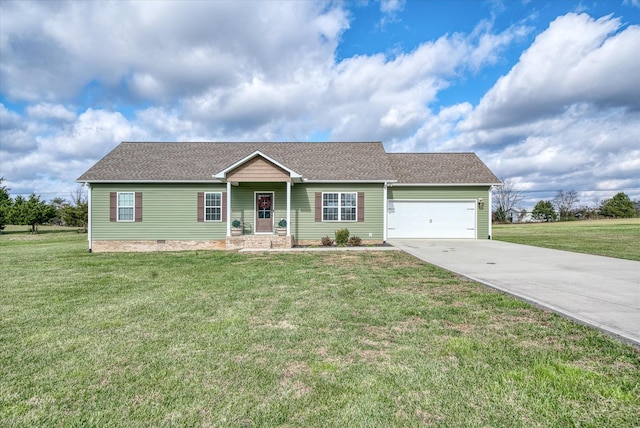 ranch-style home featuring a garage and a front lawn