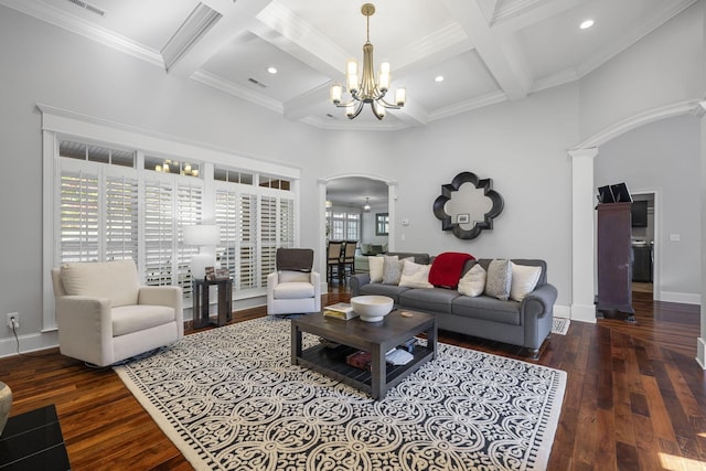 living room with beamed ceiling, a notable chandelier, dark hardwood / wood-style flooring, and coffered ceiling