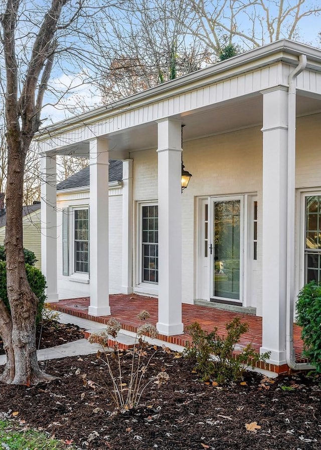 entrance to property with a porch